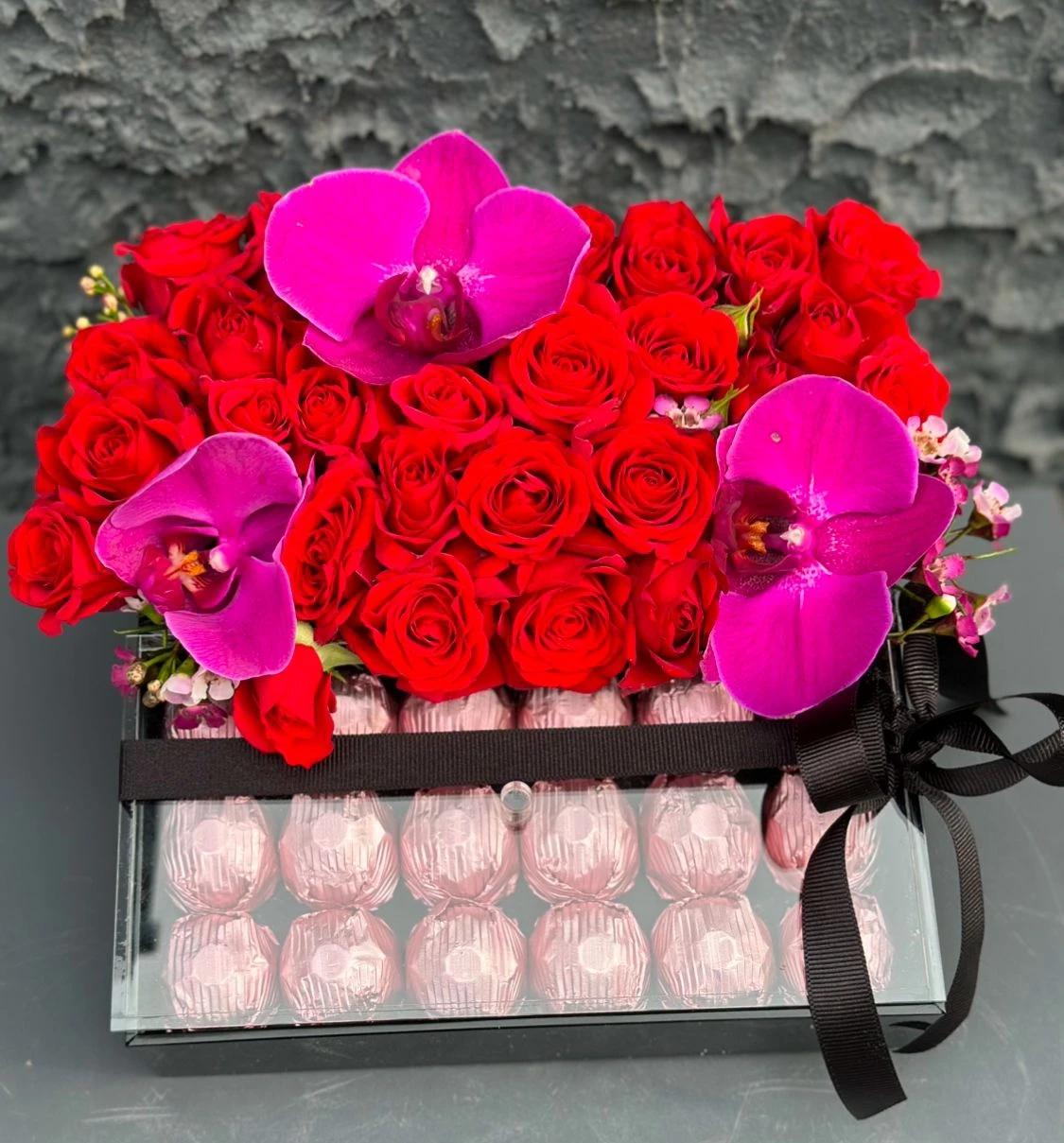 Box of red roses and chocolates